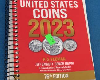Lot 261. 2023 Official Red Book paperback edition. Prices are not current, but the book is an excellent resource for mintage and general coin information