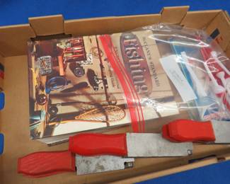 Lot 241. Fishing encyclopedia, three Herter's sinker and jig-head molds, and more