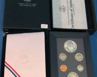 Lot 371. 1990 US Eisenhower Centennial Coin Prestige Set. The dollar coin is .900 pure silver 26.730 grams