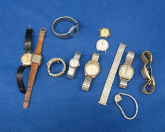 Lot 135. Eight watches plus some parts and pieces, working condition unknown