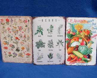 Lot 335. Three new metal flower or plant signs