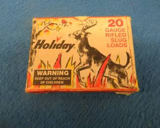 Lot 39. 1960s era Holiday 20-gauge rifled slug box with 3 rounds