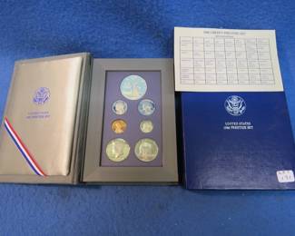 Lot 375. 1986 US Mint Liberty Prestige Set. The dollar coin is .900 pure silver 26.730 grams