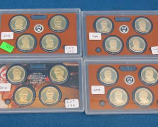 Lot 260. Four sets of 4 each gold-plated Presidential Dollars: ($16 total) 2010, 2011, 2013, and 2014