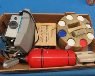 Lot 430. Polaroid Camera, poker chips, and more