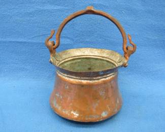 Lot 105. Old copper pot with cast-iron handles