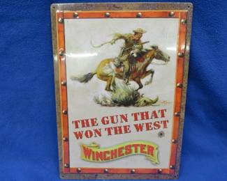 Lot 328. 12" x 17" Winchester sign