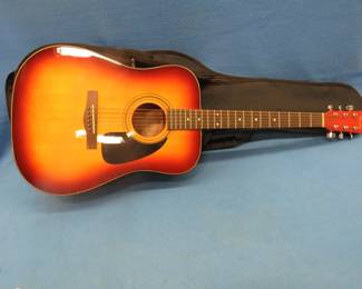 Lot 13. Fender acoustic guitar.  Model DG-11  SB.  Excellent condition.  Includes case.