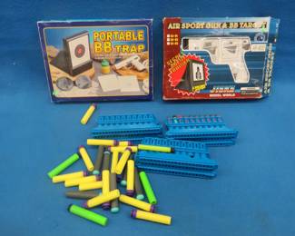 Lot 90. Two air soft/BB gun targets and Nerf darts with clips