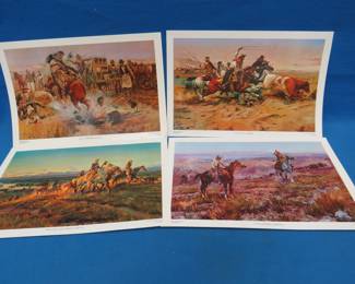 Lot 249. Four Charles M Russell vinyl placemats.  17.5" x 11.5"