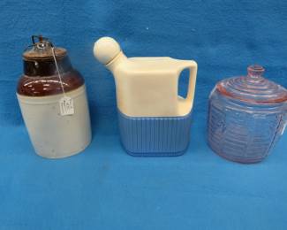 Lot 197. Western Stoneware jar, pink depression cookie jar, and a blue/white pitcher