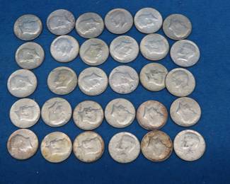 Lot 278. Thirty 40% silver Kenney Half Dollar Coins