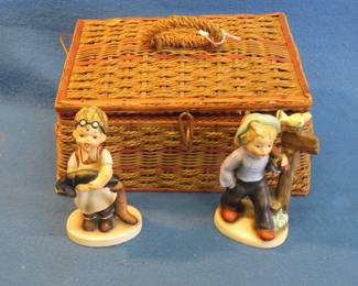 Lot 412. Wicker basket and two porcelain figurines