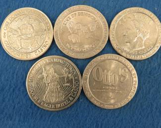 Lot 398. Five old casino tokens.  Many are from closed casinos.