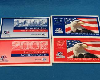 Lot 112. 2002 and 2003 US Mint P and D Uncirculated Coin Sets