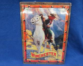 Lot 329. 12" x 17" Winchester sign