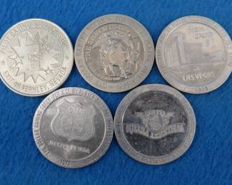 Lot 397. Five old casino tokens.  Many are from closed casinos.