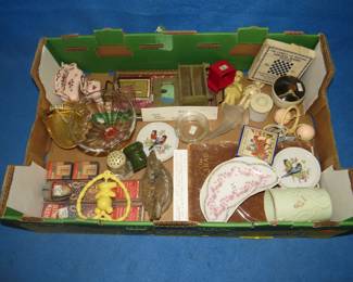 Lot 34. Vintage collectibles including sparklers, a 1927 Shattuck yearbook, baby rattle, and much more