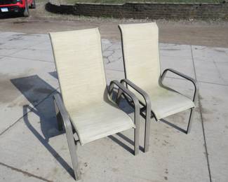 Lot 302. Two aluminum-framed patio chairs