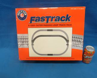 Lot 85. Lionel FasTrack outer passing loop.  New in the box.