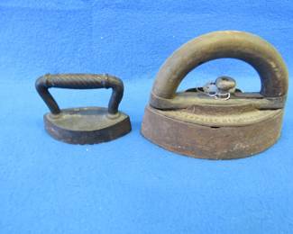 Lot 367. Two sad irons.  One is solid cast iron.