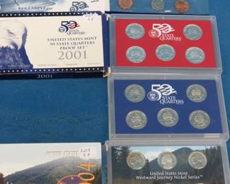 Lot 268. Uncirculated US Mint 1999 P coin set, State Quarter sets from 2001 and 2003, and a 2004 Westward Journey Nickel Series Coin Set