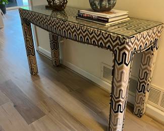 Fabric Parsons table with nailhead and glass top