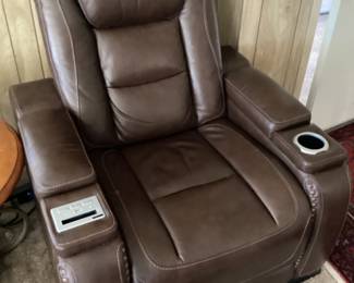 Electric leather recliner with storage and charging ports