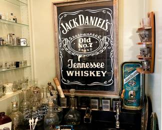 Some very rare and collectible Jack Daniels bottles, rock glasses, shot glasses, tins and so much more!
