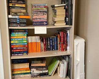 Books and shelving unit.