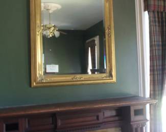 Large over mantel beveled mirror, mint condition.
