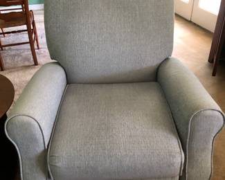 One of Two Upholstered Recliners