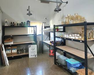 Venue supplies including multiple votive and hurricane glass candle holders, hanging candle lanterns, and so much more!