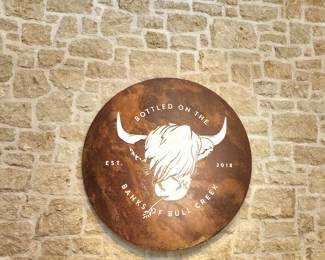 Large Bull Creek Distillery sign