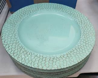 Beautiful gold and teal chargers to create beautiful place settings for your next event!