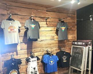 Gift shop including A-frame chalboard signs, tshirts and tank tops from S-2XL, sunglasses and other items!