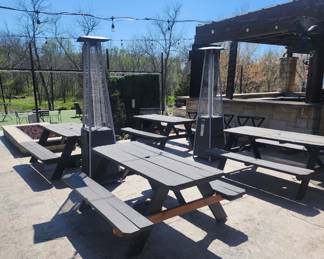 Large wooden picnic tables and outdoor propane heaters, we even have a few propane tanks!