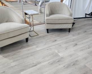 Matched pair of softly covered round back chairs