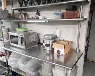 Microwave, plastic food prep and storage, food serving cones and a Nemco soup warmer