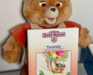 Teddy Ruxpin with “The Airship” book and cassette tape.