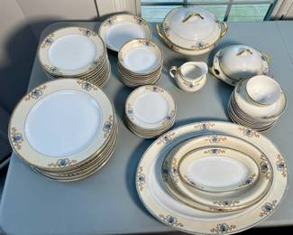 62 piece Meito china dinnerware set.