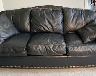 Thomasville sofa with nailhead detail.