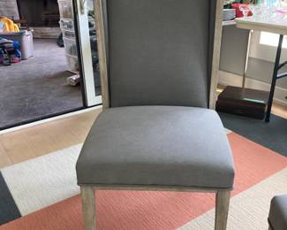 One of four beautiful chairs, gray fabric, light colored wood