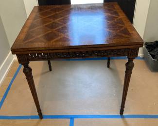 Gorgous parkay top table that opens ou to a full sized table. See following pictures...