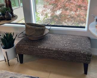 Very nice upholstered bench, more faux plants