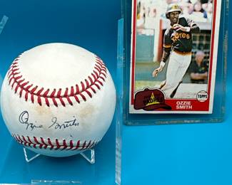 12.  Ozzie Smith Ball & Card.  Hall of Fame Cardinal.  Not Authenticated