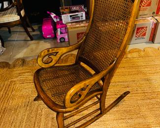 PRICE:$40.00-ANTIQUE ROCKING CHAIR-HAS HOLE
21”W x 33”D x 41”H 
