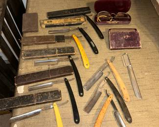 Numerous straight edge razor blade, some with sheaths - some with out. NOTE: the eye glass case states - Robert A Turcott M.D. Lake Mills, WIS. The "WIS" should indicate that this case is Oct, 1963 or older.  
