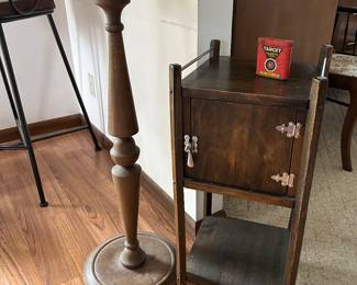 plant stand, Target cigarette tin case on top of the smoking stand