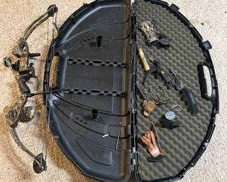 Flambeau compound bow, accessories and case.